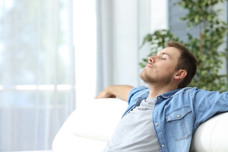 man enjoying fresh air at home